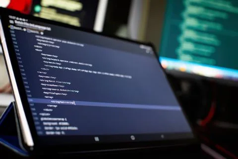 IT business.Monitor closeup of function source code. Project managers work ne Stock Photos