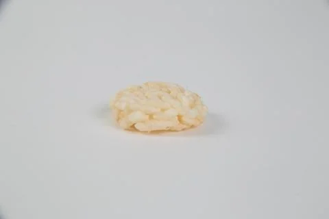 It is Circle crispy rice isolated on white. Stock Photos
