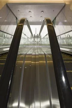 It is a close up with escalator in a building. Foto stock