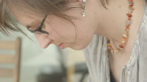 It is close-up image of concentrated female artist working Stock Footage 67167609