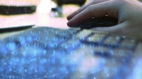 IT Computer concept - Man uses wireless mouse to create software code Stock Footage 76327991