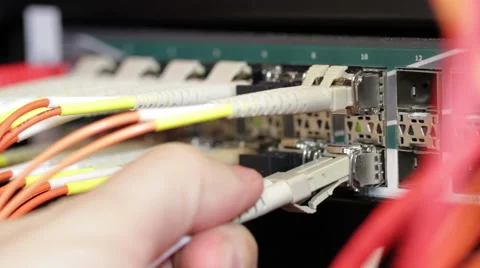 IT consultant connecting Fiber Network Cable Stock Footage 53063995