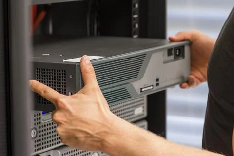 It consultant install network router Stock Photos
