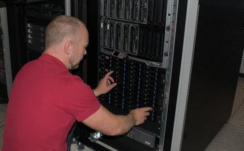 IT consultant performs work in a data center Stock Photos