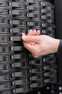 IT Consultant replace SAN harddrive Stock Photos