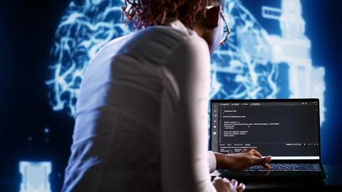 IT consultant writing AI script Foto stock