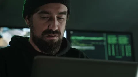 IT Cyber Security Hacker typing on laptop, hacking computer system Stock Footage 228569489