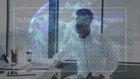 IT data analyst viewing laptop and initiating animated overlay transforming into Stock Footage 313328128