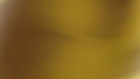 It depicts a blurry brown gradient background. Stock Footage 292709430