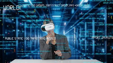 IT developer analyzing intelligent coder system running data by VR. Contraption. Stock Photos