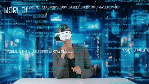 IT developer analyzing intelligent coder system running data by VR. Contraption. Stock Photos