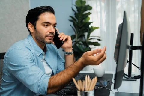 IT developer calling to coworker solving problem coding system on pc. Surmise. Stock Photos