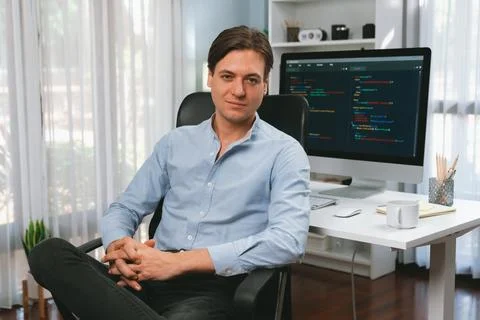 IT developer looking camera with online software development. Pecuniary. 스톡 사진