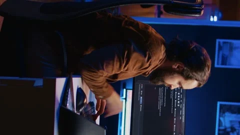 IT developer pressed by deadline, drinking coffee and doing multitasking Stock Footage 265107954