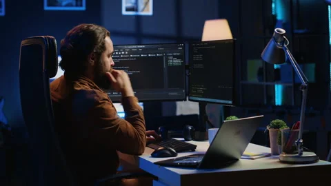 IT developer pressed by deadline, drinking coffee and doing multitasking Stock Footage 265339741