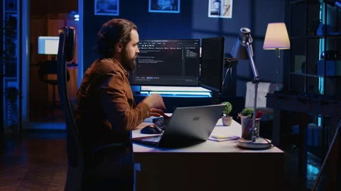 IT developer pressed by deadline, drinking coffee and doing multitasking Stock Footage 265510345