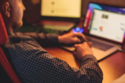 IT developer programmer working and coding on his worplace at home, laptop an 스톡 사진