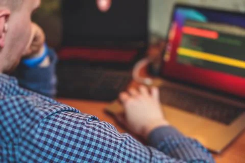 IT developer programmer working and coding on his worplace at home, laptop an 스톡 사진