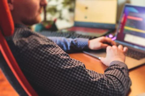 IT developer programmer working and coding on his worplace at home, laptop an 스톡 사진