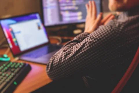 IT developer programmer working and coding on his worplace at home, laptop an 스톡 사진