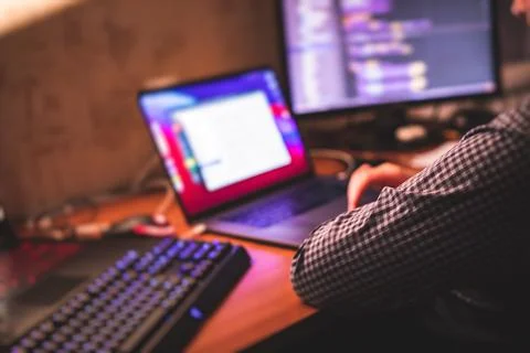 IT developer programmer working and coding on his worplace at home, laptop an 스톡 사진