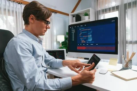 IT developer selecting by point on coding online software. Pecuniary. Foto stock