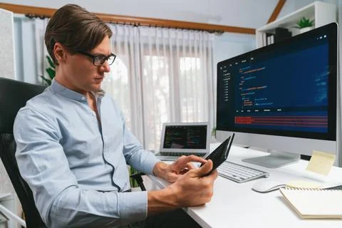 IT developer selecting by point on coding online software. Pecuniary. Foto stock