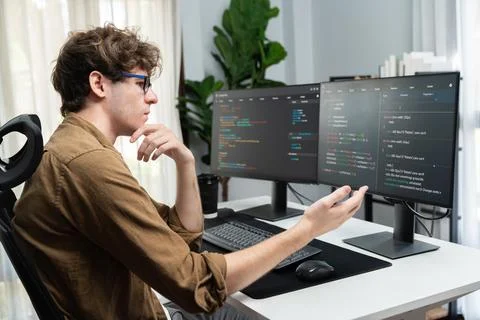 IT developer with stressful overworked in creating online software code. Gusher. Foto stock