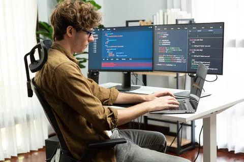 IT developer with stressful overworked in creating online software code. Gusher. Foto stock