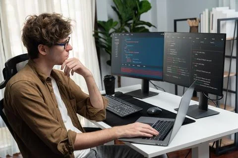 IT developer with stressful overworked in creating online software code. Gusher. 스톡 사진