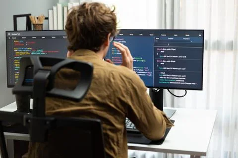 IT developer with stressful overworked in creating online software code. Gusher. 스톡 사진