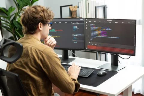 IT developer with stressful overworked in creating online software code. Gusher. 스톡 사진