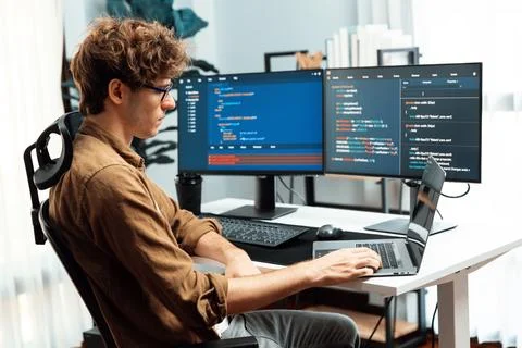 IT developer with stressful overworked in creating online software code. Gusher. 스톡 사진