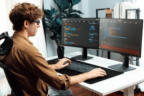 IT developer with stressful overworked in creating online software code. Gusher. Stockfoto's