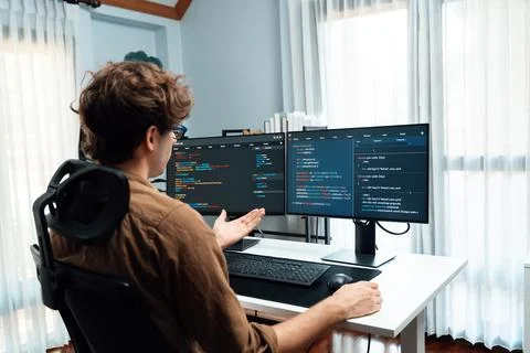 IT developer with stressful overworked in creating online software code. Gusher. 스톡 사진
