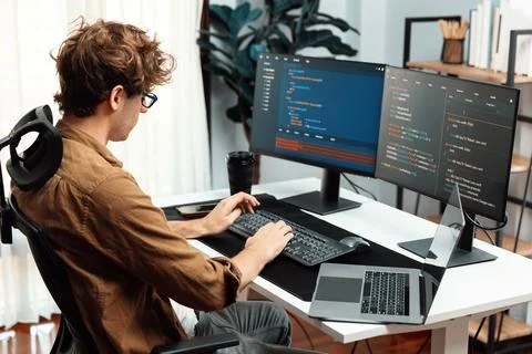 IT developer with stressful overworked in creating online software code. Gusher. Foto stock