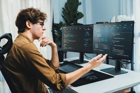 IT developer with stressful overworked in creating online software code. Gusher. 스톡 사진