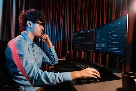 IT developer thinking online software information coding on pc screen. Gusher. Stock Photos