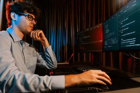 IT developer thinking online software information coding on pc screen. Gusher. Stock Photos