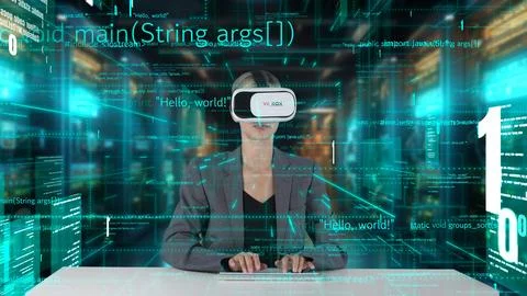 IT developer typing computer code for analyzing intelligent by VR. Contraption. Foto stock