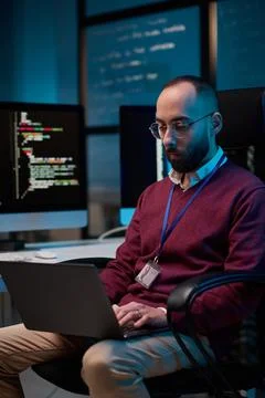 IT Developer using Laptop at Workplace 스톡 사진
