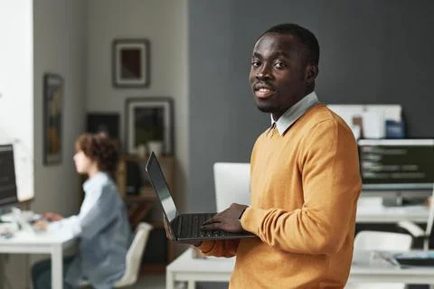 IT developer working on laptop at IT office Stock Photos
