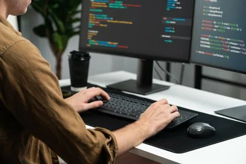 IT developer working online software development coding on pc screens. Gusher. 스톡 사진