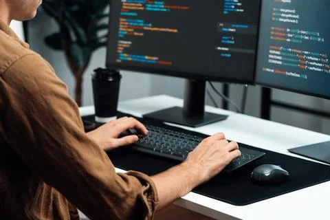 IT developer working online software development coding on pc screens. Gusher. 스톡 사진