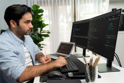 IT developer writing data memo software development on paper's coding. Surmise. 스톡 사진