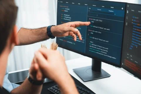 IT developers creating online software development information. Sellable. Stock Photos