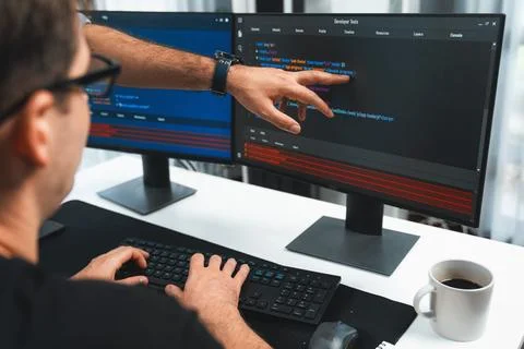 IT developers creating online software development information. Sellable. Stock Photos