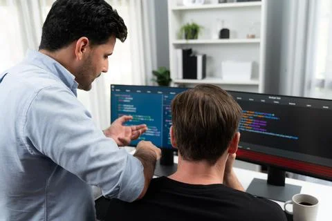 IT developers creating online software development information. Sellable. Stock Photos