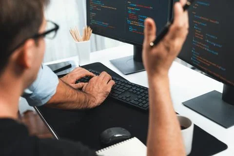 IT developers creating online software development information. Sellable. Stock Photos