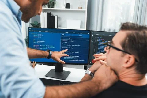 IT developers creating online software development information. Sellable. Stock Photos